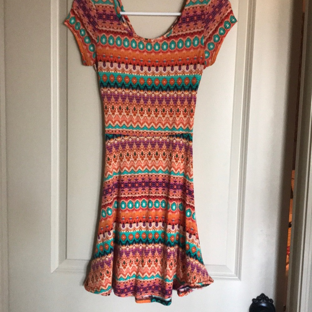 Multicolored t-shirt dress with crisscross back!